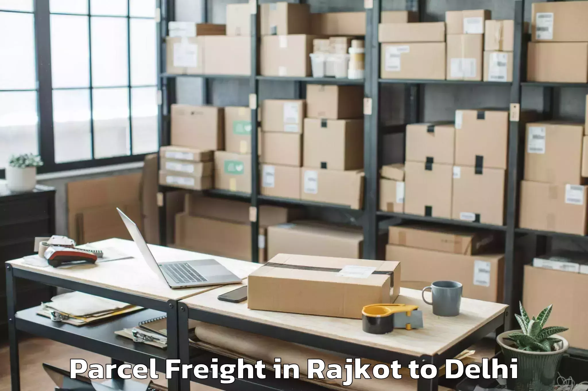 Get Rajkot to Flatted Factory Complex Okhla Parcel Freight